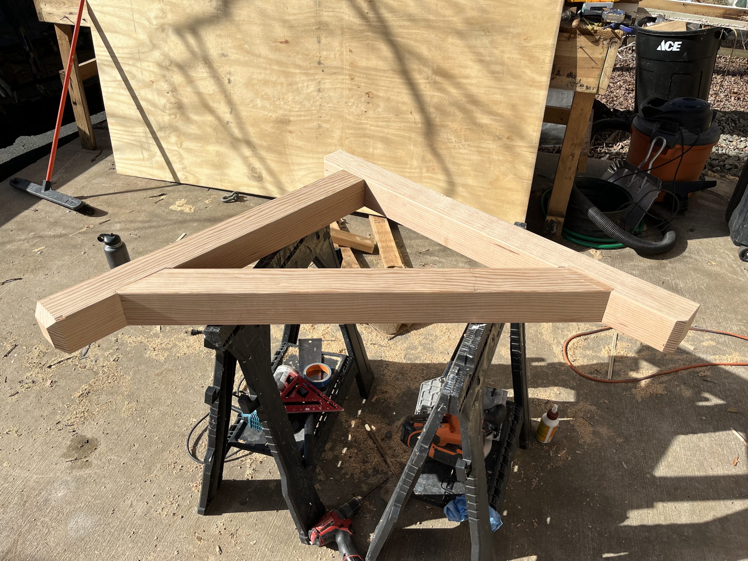 Custom douglas fir brace being assembled for the awning.
