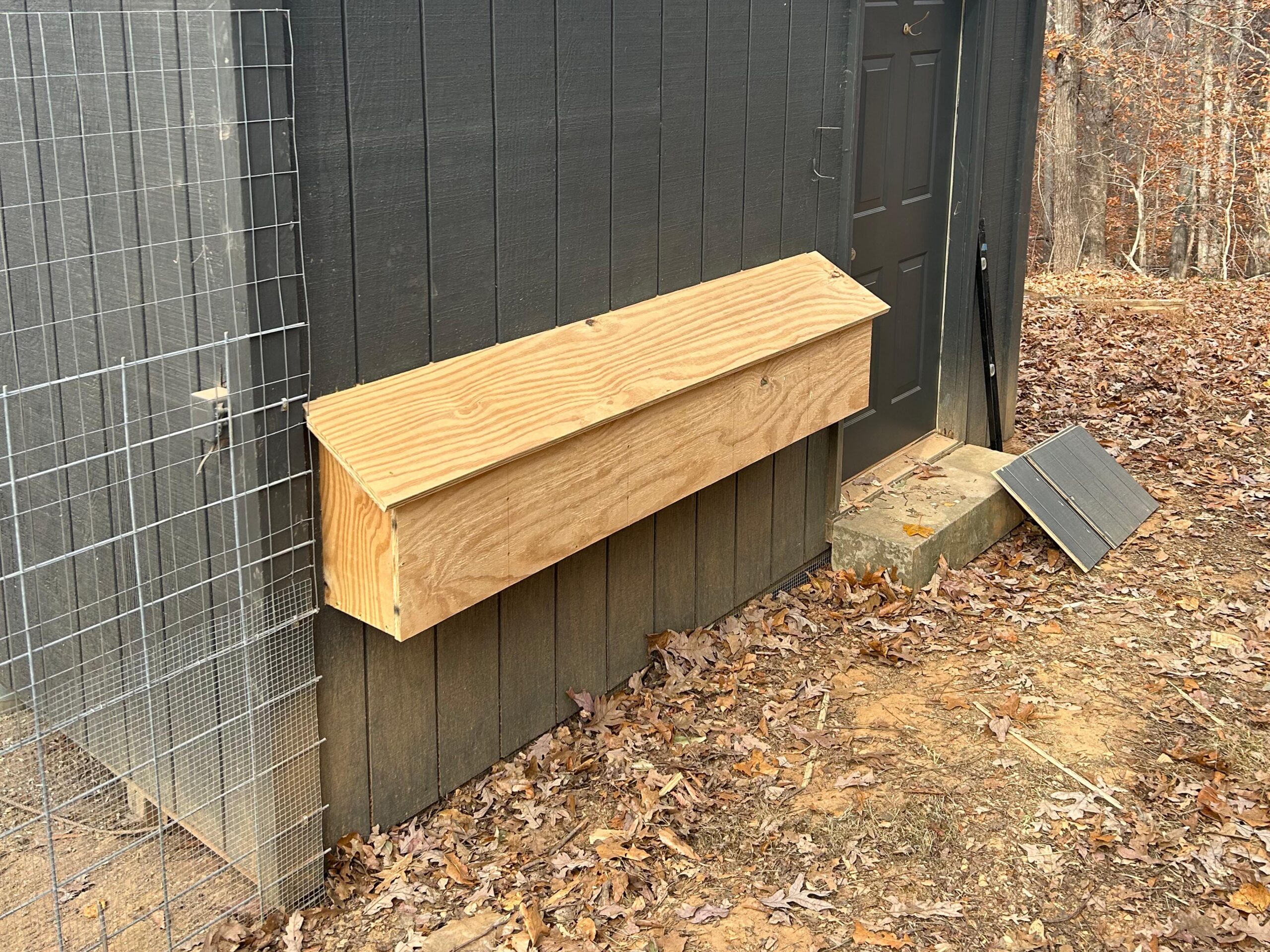 Chicken coop nesting boxes.